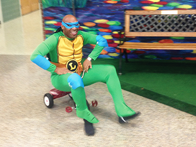 Fun principal incentives to motivate students: ride a tricycle