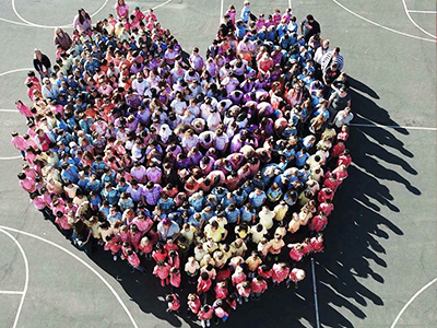 Heart-shape aerial group photo